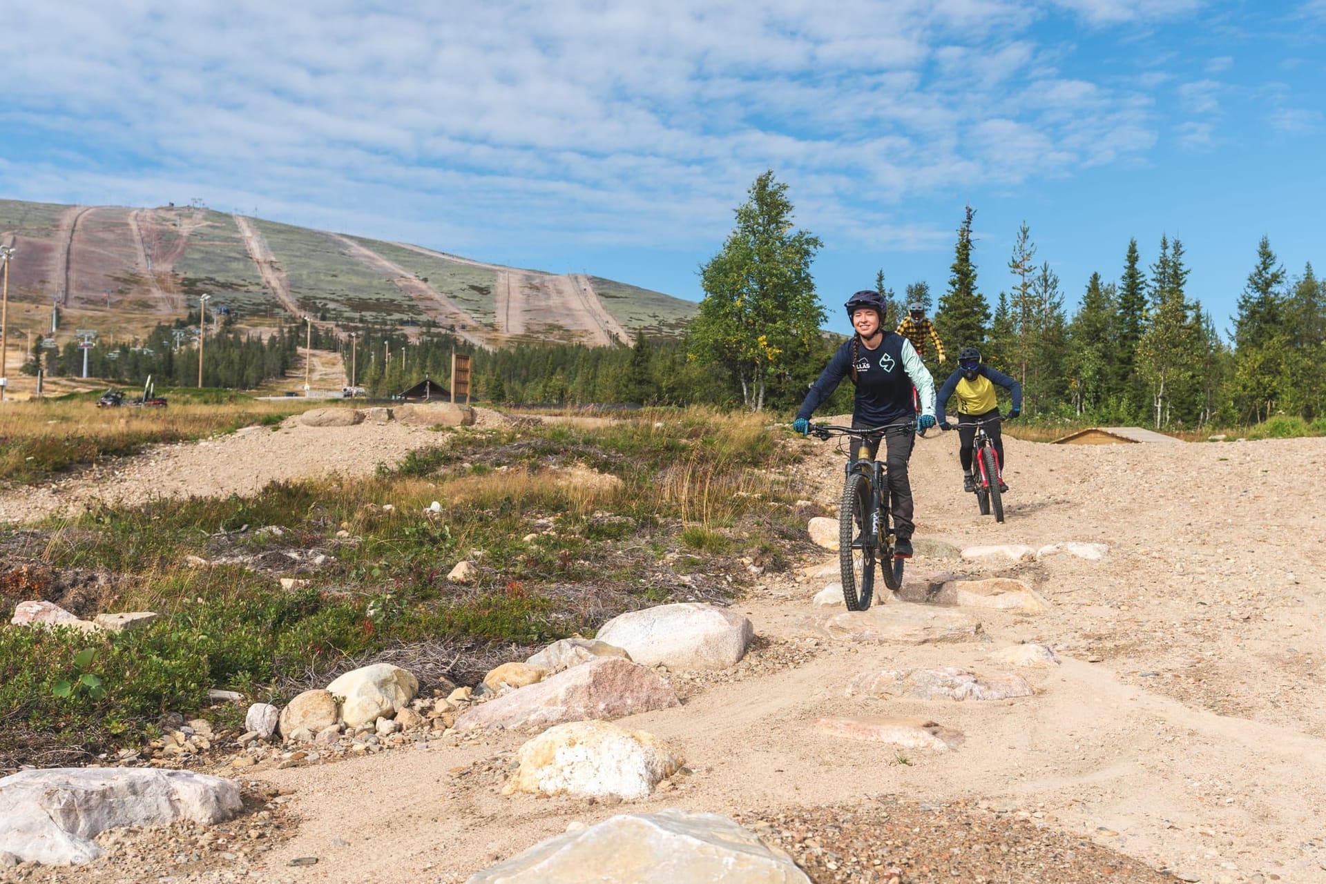 Rider practising jumps on the Mountain Biking Technique Course at Ylläs