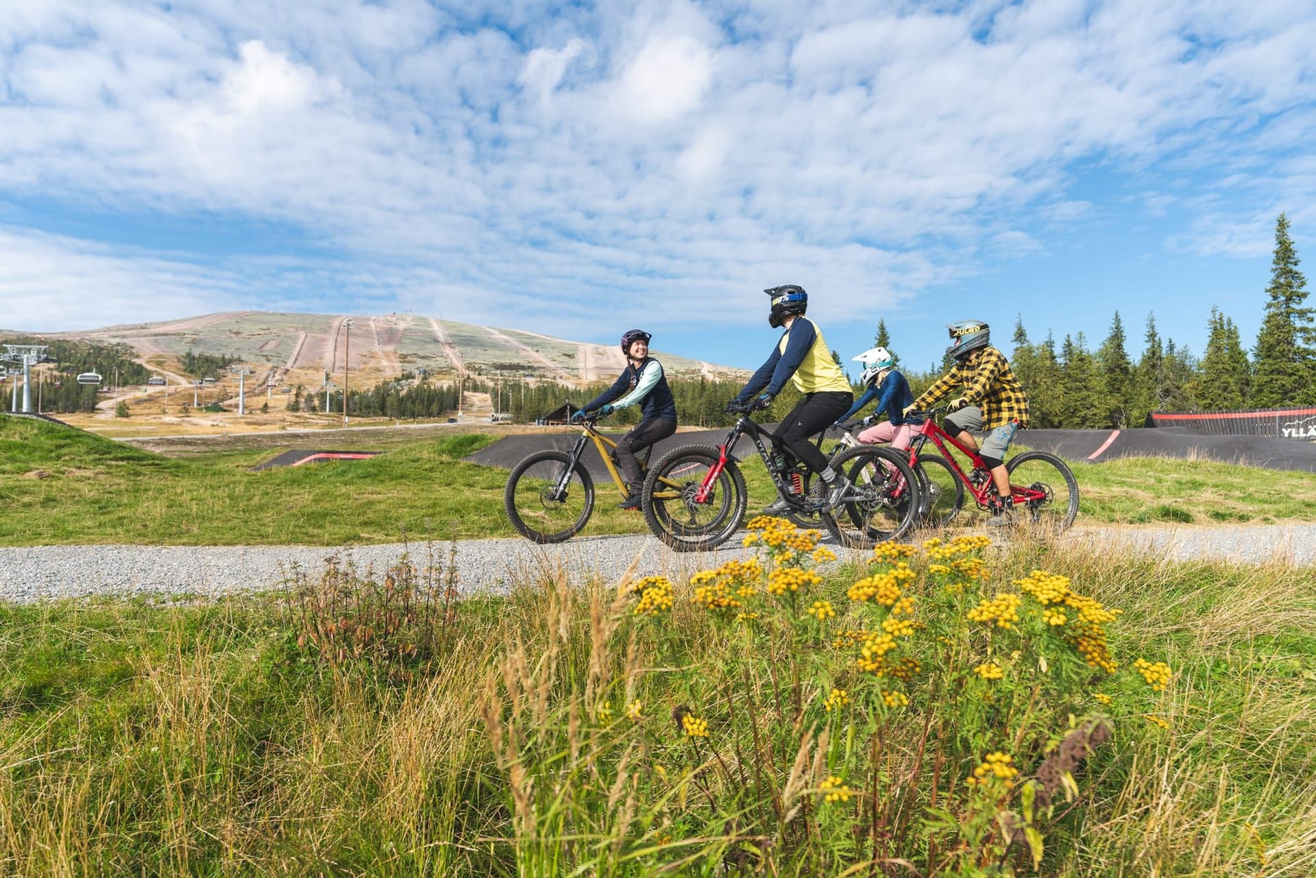Rider on a berm during the Mountain Biking Technique Course at Ylläs