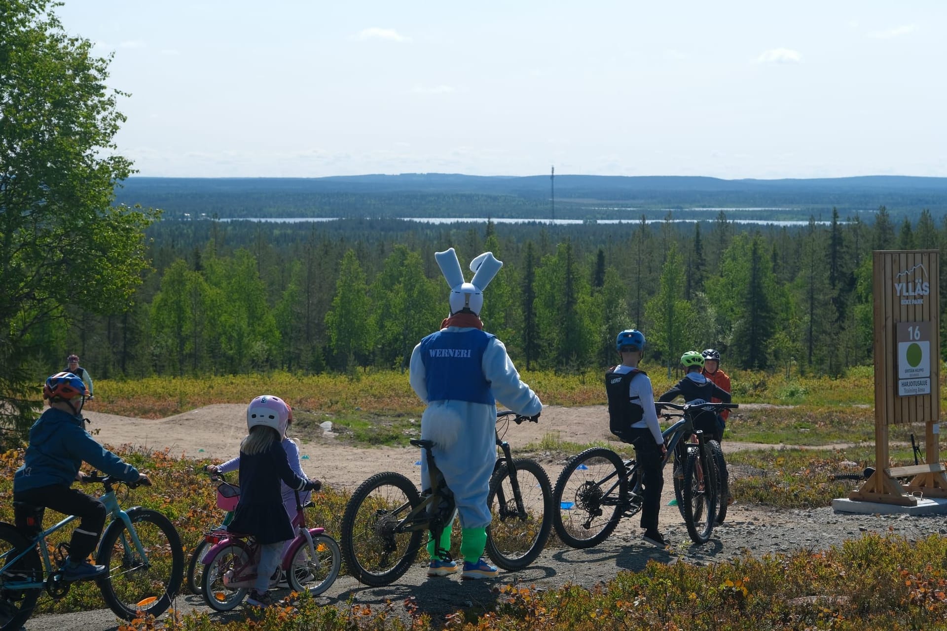 Children learning mountain biking skills at Ylläs Bike Park.