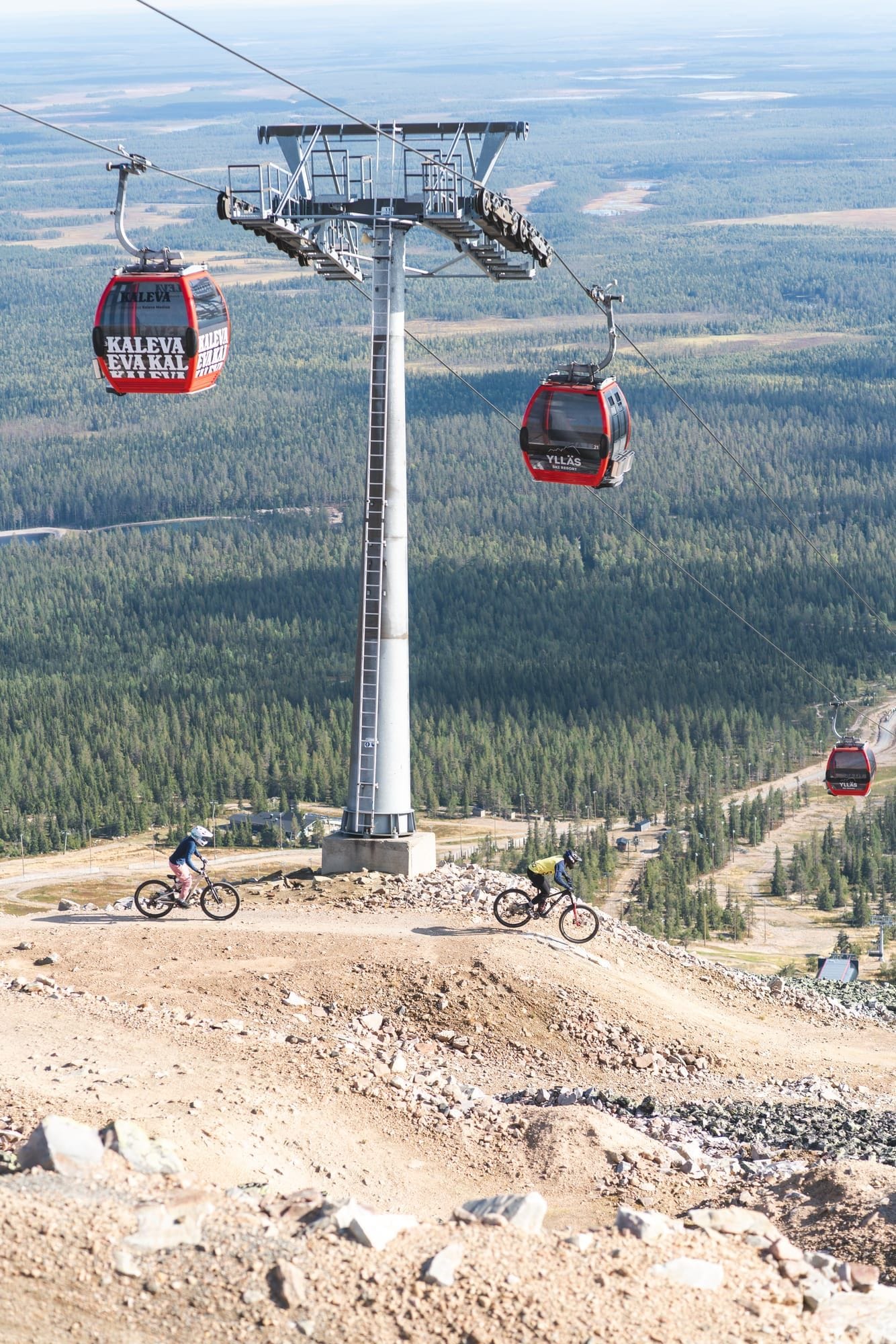 Rider launching off a large jump on the 95980 Murica trail at Ylläs Bike Park