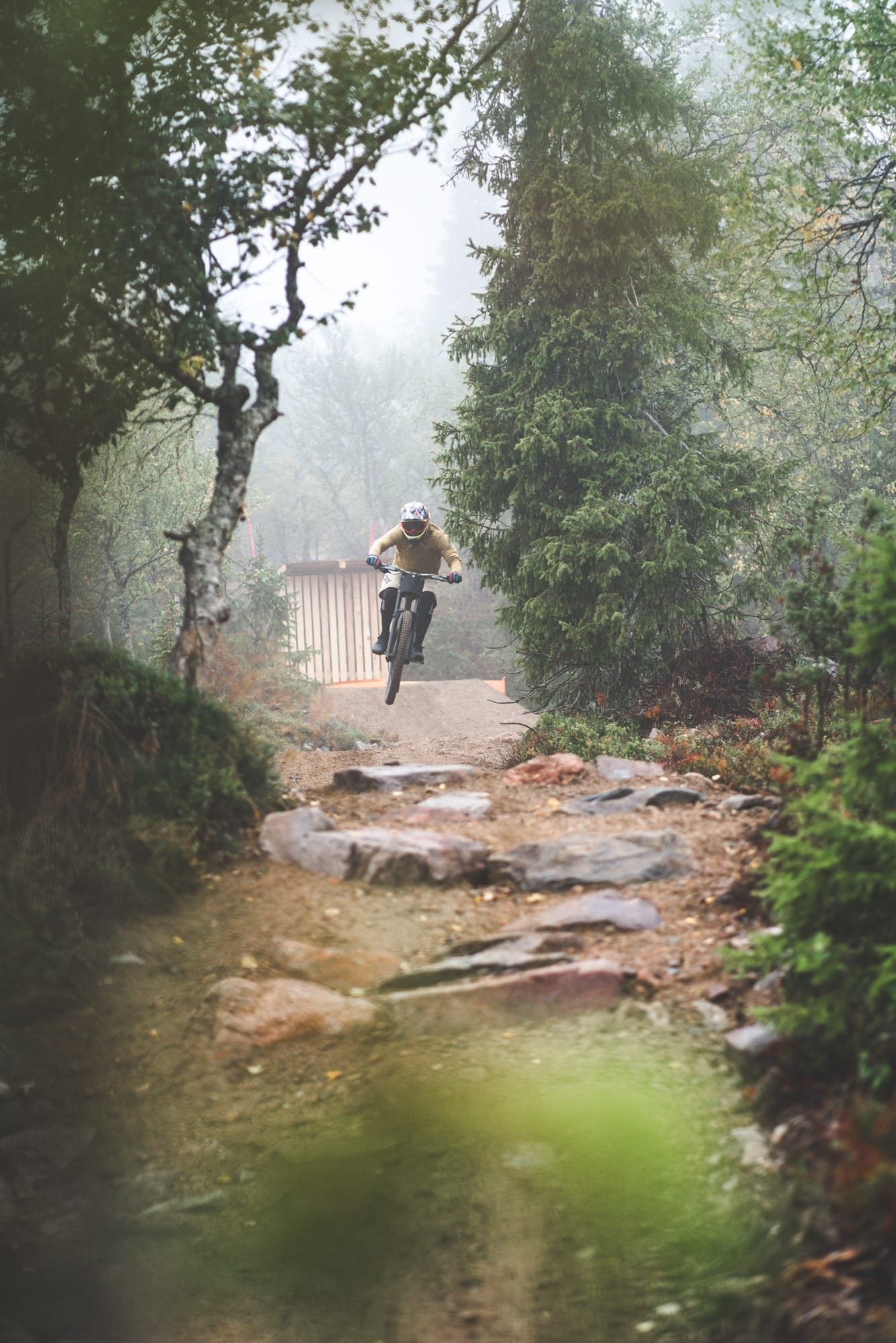 Mountain biker navigating the seven-metre gap jump on Mr. Hankey at Ylläs