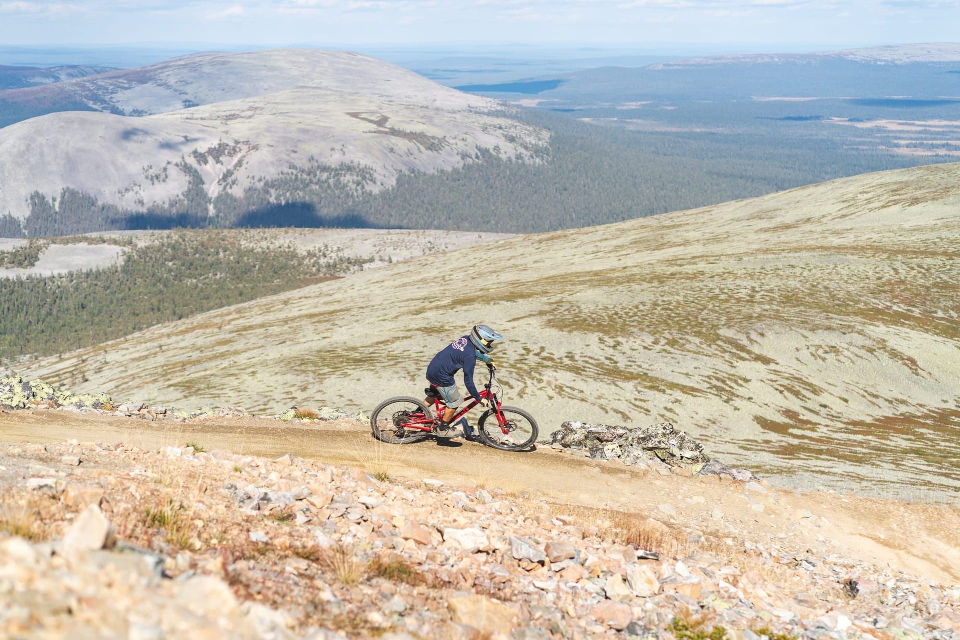 Rider at speed on the Reindeer Rally trail at Ylläs Bike Park
